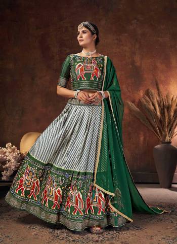 Grab These Beautiful Colored Lehenga Choli Pair With Designer Blouse And Dupatta.These Lehenga And Blouse Are Fabricated On Velvet Tussar Silk Pair With Velvet Tussar Silk Dupatta.Its Beautified With Digital Patola Printed And Swarovski Work.