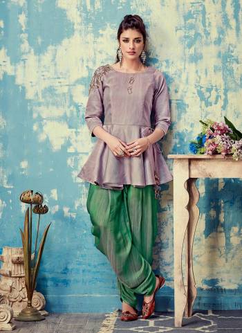 For A Different Look, Grab These Readymade Pair in Fine Colored.These Kurti is Fabricated On Raw Silk Pair With Dual Tone Silk Bottom.Its Beautified With Designer Embroidery Hand Work.