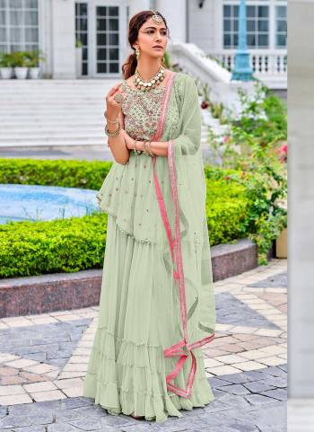 Grab These Beautiful Colored Plazzo Suit.These Top is And Botom Are Fabricated On Viscose Georgette Pair With Soft Net Dupatta.Its Beautified With  Designer Heavy Embroidery Work.