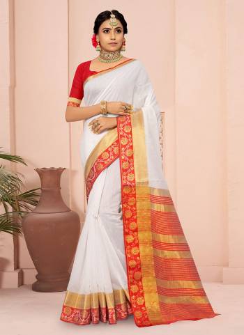 For A Different Look,Grab These White Colored Saree Pair With Red Blouse.These Saree And Blouse Are Fabricated On Cotton Blend.Its Beautified With Wevon Border Pallu Designer Work.