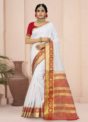 For A Different Look,Grab These White Colored Saree Pair With Red Blouse.These Saree And Blouse Are Fabricated On Cotton Blend.Its Beautified With Wevon Border Pallu Designer Work.