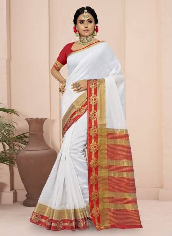 For A Different Look,Grab These White Colored Saree Pair With Red Blouse.These Saree And Blouse Are Fabricated On Cotton Blend.Its Beautified With Wevon Border Pallu Designer Work.