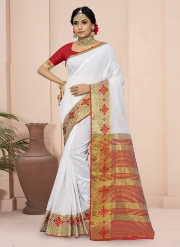 For A Different Look,Grab These White Colored Saree Pair With Red Blouse.These Saree And Blouse Are Fabricated On Cotton Blend.Its Beautified With Wevon Border Pallu Designer Work.