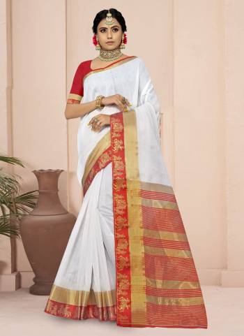 For A Different Look,Grab These White Colored Saree Pair With Red Blouse.These Saree And Blouse Are Fabricated On Cotton Blend.Its Beautified With Wevon Border Pallu Designer Work.