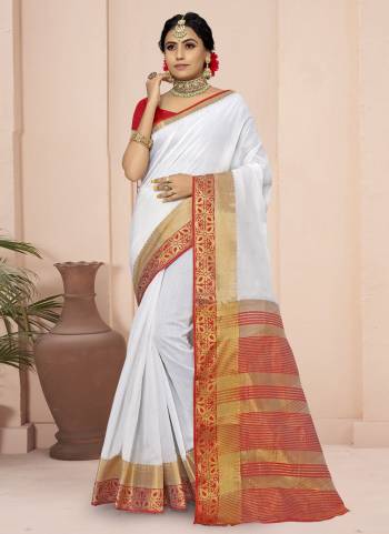 For A Different Look,Grab These White Colored Saree Pair With Red Blouse.These Saree And Blouse Are Fabricated On Cotton Blend.Its Beautified With Wevon Border Pallu Designer Work.