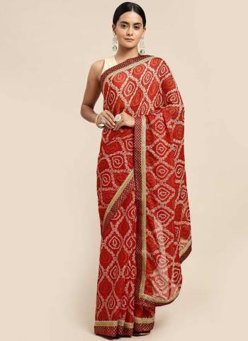 For A Beautiful Look,Grab These Saree in Fine Colored pair With Blouse.These Saree And Blouse Are Fabricated On Chiffon.Its Beautified With Bandhej Printed Designer Work.