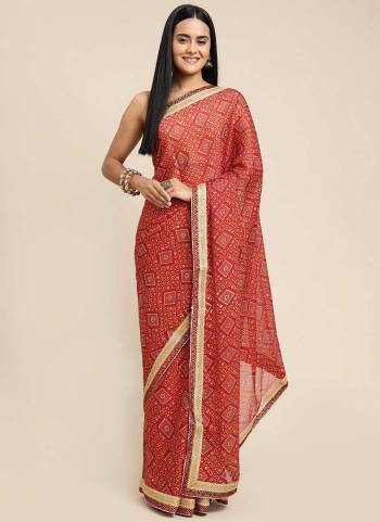 For A Beautiful Look,Grab These Saree in Fine Colored pair With Blouse.These Saree And Blouse Are Fabricated On Chiffon.Its Beautified With Bandhej Printed Designer Work.