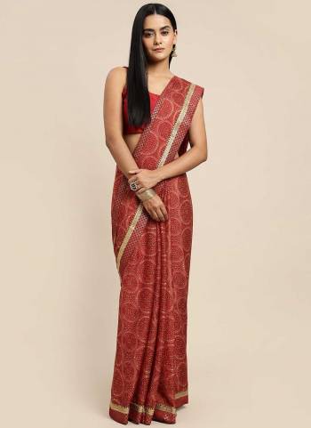 For A Beautiful Look,Grab These Saree in Fine Colored pair With Blouse.These Saree And Blouse Are Fabricated On Chiffon.Its Beautified With Bandhej Printed Designer Work.