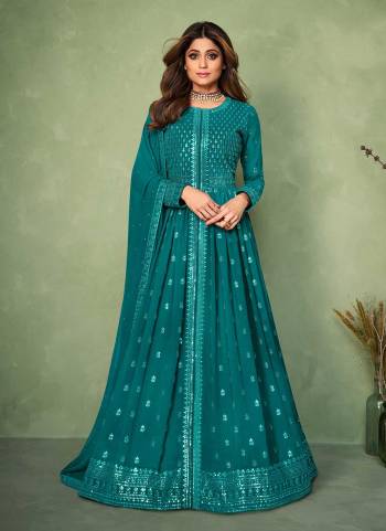 Grab these Free size stiched suit in All over fine colored.These Top and bottom are fabricated on Georgette pair With Georgette Dupatta.Its Beautified with  Designer Heavy Embroidery Work.