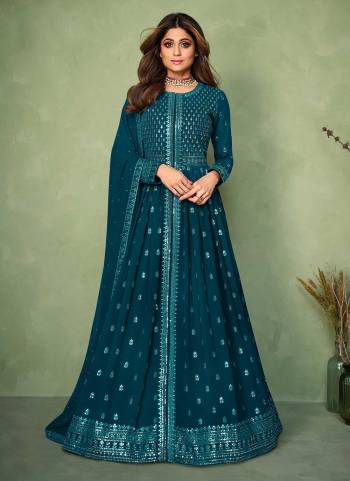 Grab these Free size stiched suit in All over fine colored.These Top and bottom are fabricated on Georgette pair With Georgette Dupatta.Its Beautified with  Designer Heavy Embroidery Work.