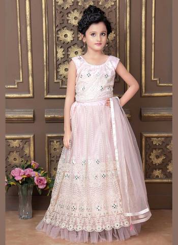 Grab These Kids Wear Lehenga Choli in Fine Colored.These Blouse And Lehenga Are Fabricated On Net Pair With Net Dupatta.Its Beautified With Designer Lucknowi,Real Mirror Embroidery Work.