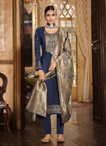 Looking Beautiful in These Suit Pair With Bottom And Dupatta.These Top And Bottom Are Fabricated On Soarer Crepe Pair With Banarasi Silk Dupatta.Its Beautified With Heavy Embroidery And Wevon Designer Work.