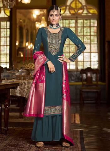 Looking Beautiful in These Suit Pair With Bottom And Dupatta.These Top And Bottom Are Fabricated On Soarer Crepe Pair With Banarasi Silk Dupatta.Its Beautified With Heavy Embroidery And Wevon Designer Work.