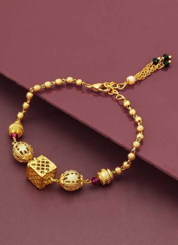  Looking Attrective To Your Personality By Pairing Up This Beautiful Brecelete With Your Ethnic Attire. This Pretty Gold Colored Brecelete Is  Beautified With Traditional Work. Buy Now.