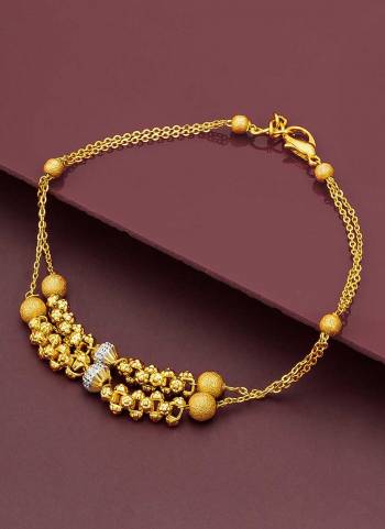  Looking Attrective To Your Personality By Pairing Up This Beautiful Brecelete With Your Ethnic Attire. This Pretty Gold Colored Brecelete Is  Beautified With Traditional Work. Buy Now.