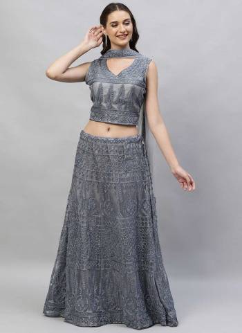 Grab These Fine Colored Lehenga Choli Pair With Designer Blouse And Dupatta.These Lehenga And Blouse Are Fabricated On Net Pair With Net Dupatta.Its Beautified With Designer Thread Embroidery Work.