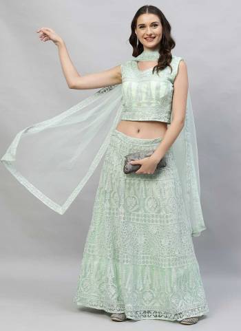 Grab These Fine Colored Lehenga Choli Pair With Designer Blouse And Dupatta.These Lehenga And Blouse Are Fabricated On Net Pair With Net Dupatta.Its Beautified With Designer Thread Embroidery Work.