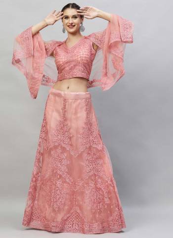 Grab These Fine Colored Lehenga Choli Pair With Designer Blouse And Dupatta.These Lehenga And Blouse Are Fabricated On Net Pair With Net Dupatta.Its Beautified With Designer Thread Embroidery Work.
