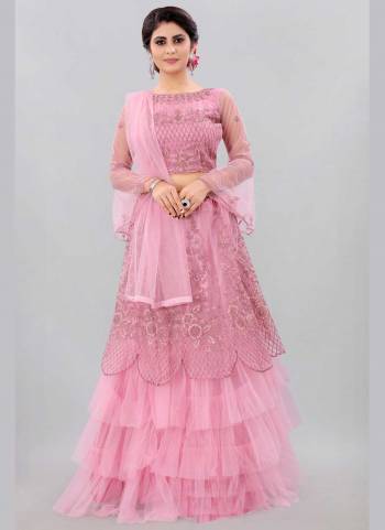 Grab These Fine Colored Lehenga Choli Pair With Designer Blouse And Dupatta.These Lehenga And Blouse Are Fabricated On Net Pair With Net Dupatta.Its Beautified With Designer Thread Embroidery Work.