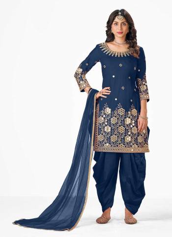 For A Festive Wear,Grab These Patiala Suit in All Over Fine Colored.These Top And Bottom Are Fabricated On Bitalian Soft Silk Pair With Net Dupatta.Its Beautified With Designer Real Mirror Embroidery Work.