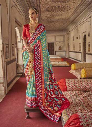 Garb These Beautiful Colored Saree Pair With Blouse.These Saree And Blouse Are Fabricated On Patola Silk.its Beautified With  Woven Designer, Digital Printed,Diamond Work.