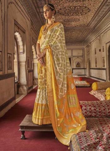 Garb These Beautiful Colored Saree Pair With Blouse.These Saree And Blouse Are Fabricated On Patola Silk.its Beautified With  Woven Designer, Digital Printed,Diamond Work.