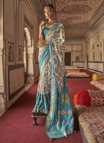 Garb These Beautiful Colored Saree Pair With Blouse.These Saree And Blouse Are Fabricated On Patola Silk.its Beautified With  Woven Designer, Digital Printed,Diamond Work.