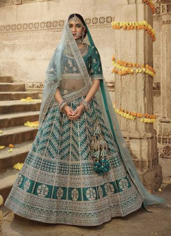 For A Designer Look,Grab These Lehenga in Fine Colored Piar With Designer Blouse And Dupatta.These Lehenga is Fabricated On Silk Pair With Raw Silk Blouse And Net Dupatta.Its Beautified With Heavy Designer Work.