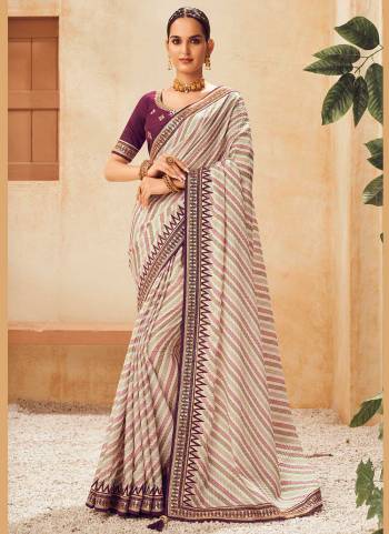 For A Beautiful Look,Grab These Fine Colored Saree Pair With Blouse.These Saree is Fabricated On Chinon  Pair With Phantom Silk Blouse.Its Beautified With Laheriya Printed And Embroidery Work.