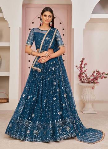 For A Designer Look,Grab These Lehenga in Fine Colored Pair With Designer Blouse And Dupatta.These Blouse And Lehenga Are Fabricated On Mono Net Pair With Mono Net Dupatta.Ist Beautified With Heavy Designer Work.