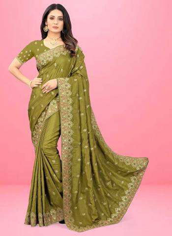 Grab These Fine Colored Saree Pair With Blouse.These Saree And Blouse Are Fabricated On Dola Silk.Its Beautified With Heavy Designer Embroidery Work.