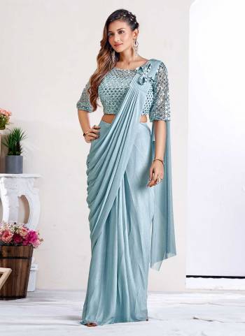 For A Beautiful Look,Grab These Saree in Fine Colored Pair With Blouse.These Saree is Fabricated On Imported Metallic pair With Net Blouse.Its Beautified With Sequance Embroidery Work.