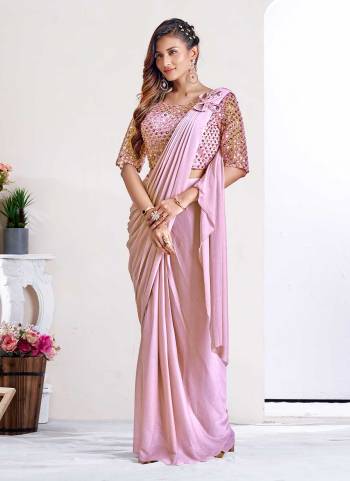 For A Beautiful Look,Grab These Saree in Fine Colored Pair With Blouse.These Saree is Fabricated On Imported Metallic pair With Net Blouse.Its Beautified With Sequance Embroidery Work.