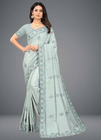 Grab These Saree in Fine Colored Pair With Blouse.These Saree And Blouse Are Fabricated On Dola Silk.Its Beautified With Heavy Designer  Embroidery Work. 