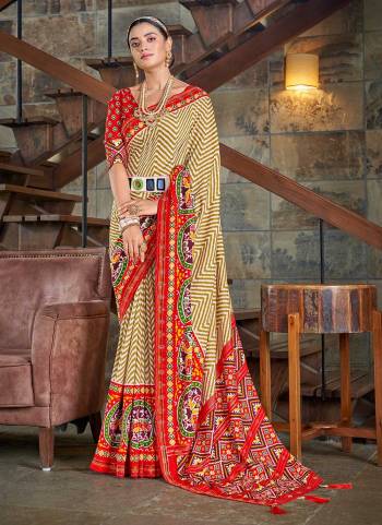 For A Different Looking Saree,Grab These Saree in All Over Fine Colored Pair With Matching Colored Blouse.These Saree And Blouse Are Fabricated On Soft Patola Silk.Its Beautified With Woven Designer And Printed Work.