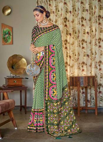 For A Different Looking Saree,Grab These Saree in All Over Fine Colored Pair With Matching Colored Blouse.These Saree And Blouse Are Fabricated On Soft Patola Silk.Its Beautified With Woven Designer And Printed Work.