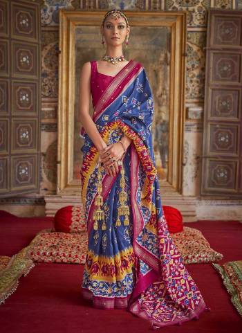 For A Designer Look,Grab These saree in Fine Colored Pair With Blouse.These Saree And Blouse Are Fabricated On  Soft Patola Silk.Its Beautified With Wevon Border Pallu,Patola Printed,Khatli Mirror Work.