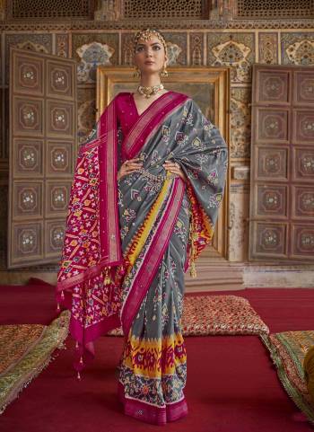 For A Designer Look,Grab These saree in Fine Colored Pair With Blouse.These Saree And Blouse Are Fabricated On  Soft Patola Silk.Its Beautified With Wevon Border Pallu,Patola Printed,Khatli Mirror Work.