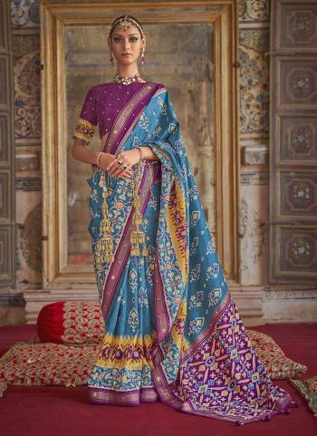 For A Designer Look,Grab These saree in Fine Colored Pair With Blouse.These Saree And Blouse Are Fabricated On  Soft Patola Silk.Its Beautified With Wevon Border Pallu,Patola Printed,Khatli Mirror Work.