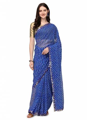 For A Casual Wear,Grab These Saree in Fine Colored Pair With Golden Colored Blouse.These Saree is Fabricated On Chiffon Pair With Jari Brocade Blouse.Its Beautified With Leriya Printed And Mirror Embroidery Border Work.