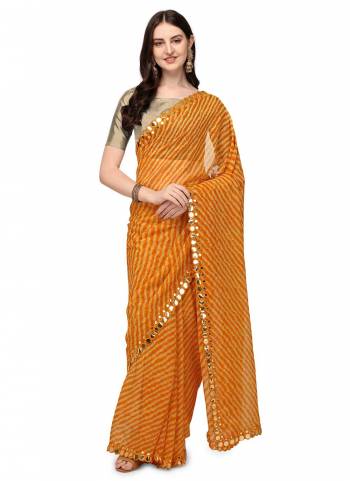 For A Casual Wear,Grab These Saree in Fine Colored Pair With Golden Colored Blouse.These Saree is Fabricated On Chiffon Pair With Jari Brocade Blouse.Its Beautified With Leriya Printed And Mirror Embroidery Border Work.