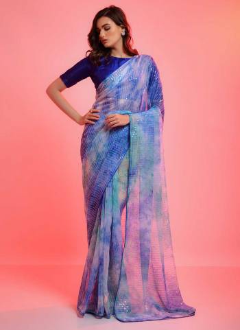 Grab These Fine Colored Saree Pair With Blouse.These Saree is Fabricated On Chiffon Pair With Banglori Satin Silk Blouse.Its Beautified With Prijam Printed And Sequance Embroidery Work.