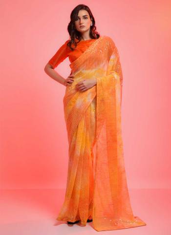 Grab These Fine Colored Saree Pair With Blouse.These Saree is Fabricated On Chiffon Pair With Banglori Satin Silk Blouse.Its Beautified With Prijam Printed And Sequance Embroidery Work.