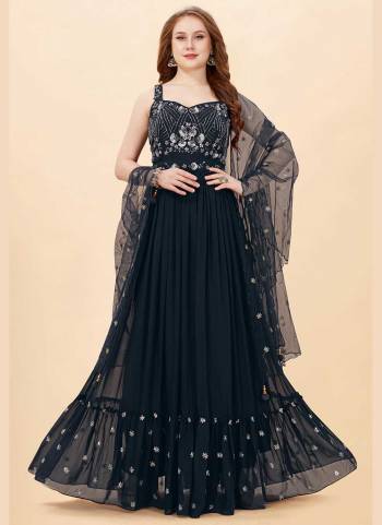 For A Designer Look,Grab These Beautiful Colored Gown Pair With Dupatta.These Gown is Fabricated On Art Silk Pair With Net Dupatta.Its Beautified With Designer Heavy Hand Embroidery Work.