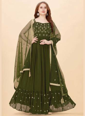 For A Designer Look,Grab These Beautiful Colored Gown Pair With Dupatta.These Gown is Fabricated On Art Silk Pair With Net Dupatta.Its Beautified With Designer Heavy Hand Embroidery Work.