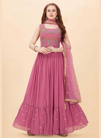 For A Designer Look,Grab These Readymade Gown in Fine Colored Pair With Fany Dupatta.These Gown is Fabricated On Georgette Pair With Net Dupatta.its Beautified With Designer Heavy Hand Embroidery Work.