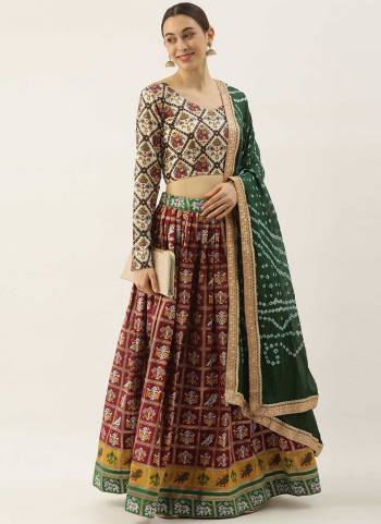 For A Designer Look,Grab These Lehenga in All Over Fine Colored Pair With Designer Dupatta And Blouse.These Lehenga Are Patola Silk And Blouse Are Fabricated On Cotton Pair With Bandhej Silk Dupatta.Its Beautified With Heavy Designer Work.