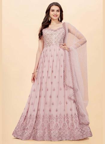 For A Beautiful Look,Grab These Suit in All Over Fine Colored Pair With Bottom And Dupatta.These Top Are Faux Georgette And Dupatta Are Fabricated On Butterfly Net Pair With Santoon Bottom.Its Beautified With Heavy Thread,Sequance Embroidery Work.