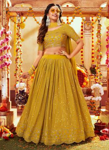 You Will Definitely Earn Lots Of Compliments Wearing This Heavy Designer Lehenga Choli In All Over Fine Color. Its Pretty Blouse, Lehenga and Dupatta Are Fabricated On Faux Georgette Beautified With Sequance Embroidery Work. Buy This Elegant Peice Now.