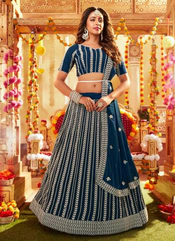 You Will Definitely Earn Lots Of Compliments Wearing This Heavy Designer Lehenga Choli In All Over Fine Color. Its Pretty Blouse, Lehenga and Dupatta Are Fabricated On Faux Georgette Beautified With Sequance Embroidery Work. Buy This Elegant Peice Now.